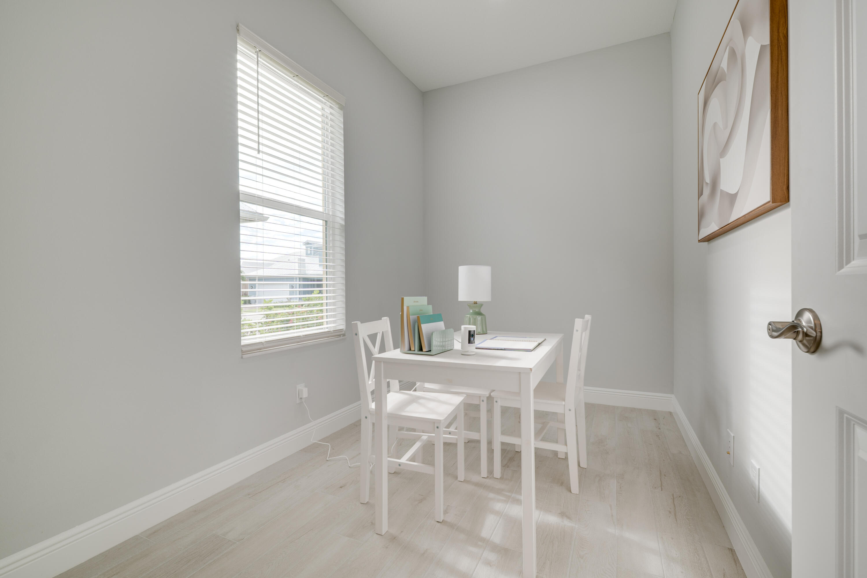 2005 Bridgepointe Circle, Unit 99 Vero Beach, FL 32967 - Photo 26 of 37 a dining room with furniture and window
