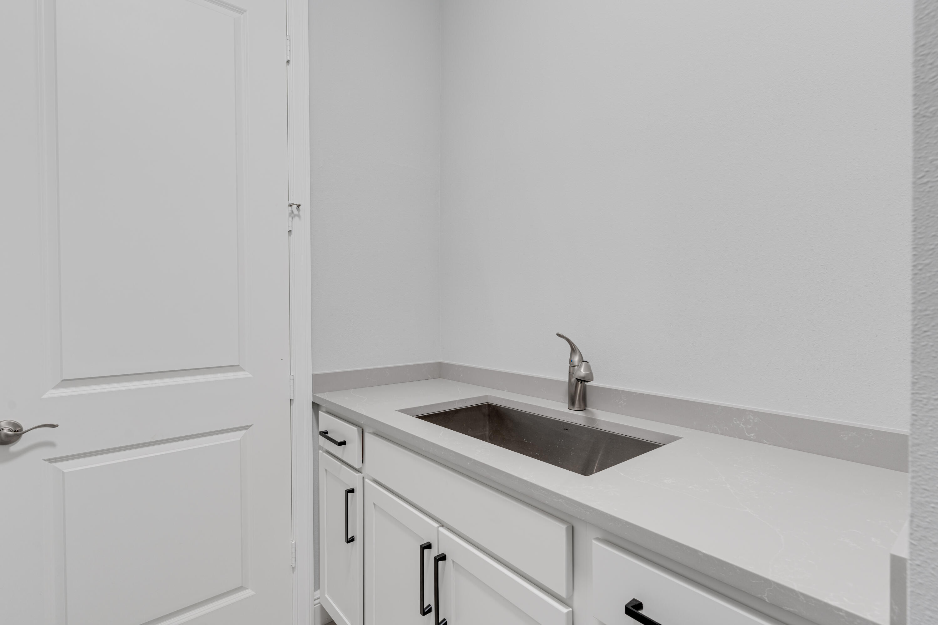 2005 Bridgepointe Circle, Unit 99 Vero Beach, FL 32967 - Photo 29 of 37 a close view of sink and tap