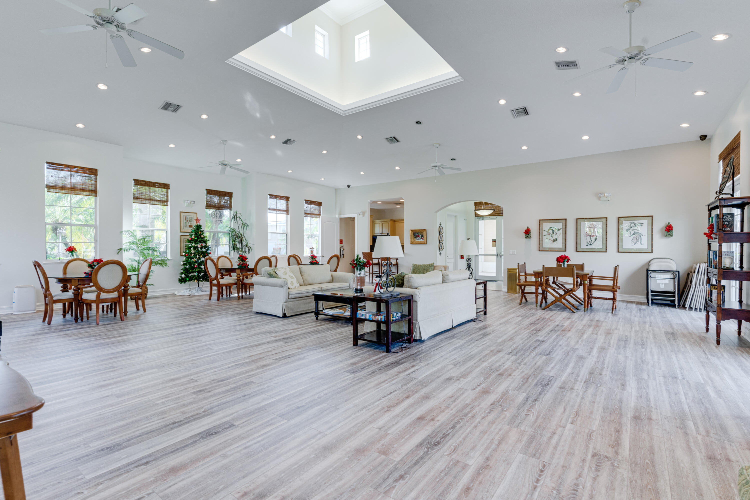 2005 Bridgepointe Circle, Unit 99 Vero Beach, FL 32967 - Photo 32 of 37 a living room with furniture and a wooden floor