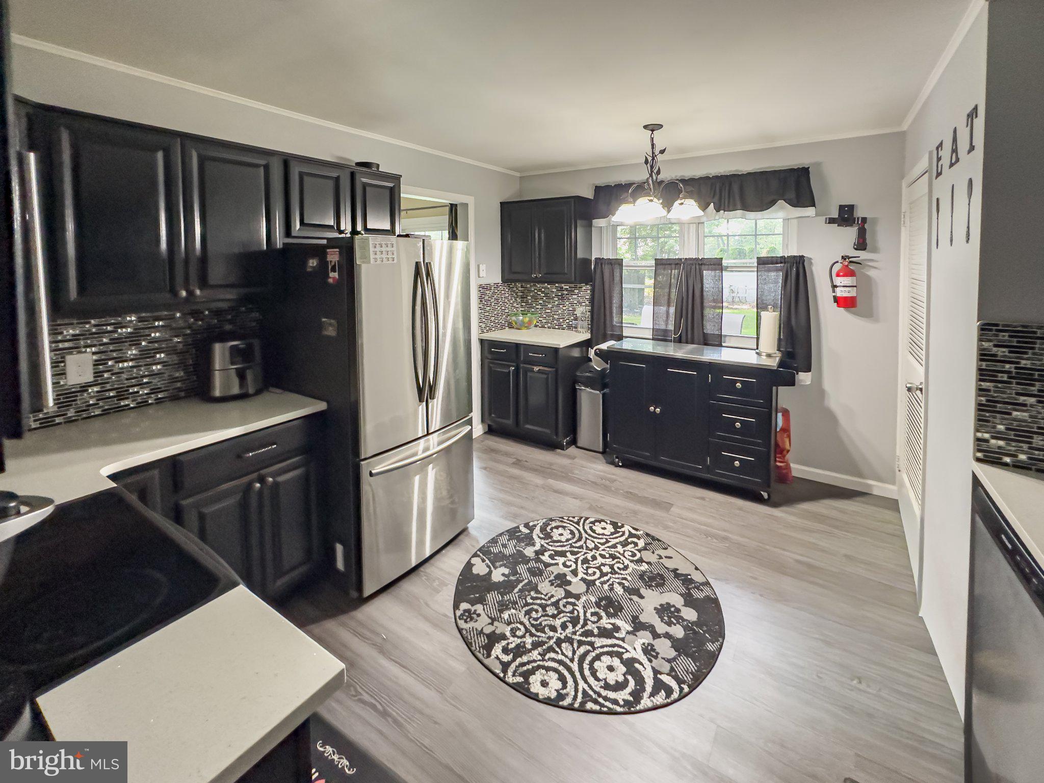 57 Tarnsfield Road Westampton, NJ 08060 - Photo 4 of 24 Modern kitchen with sleek black accents.