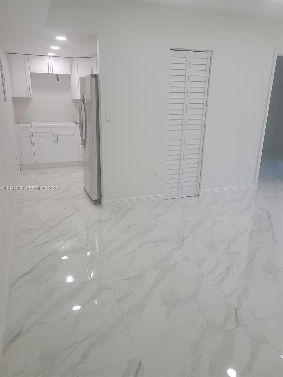 4713 Northwest 7th Street, Unit 1041 Miami, FL 33126 - Photo 19 of 19 a view of empty room