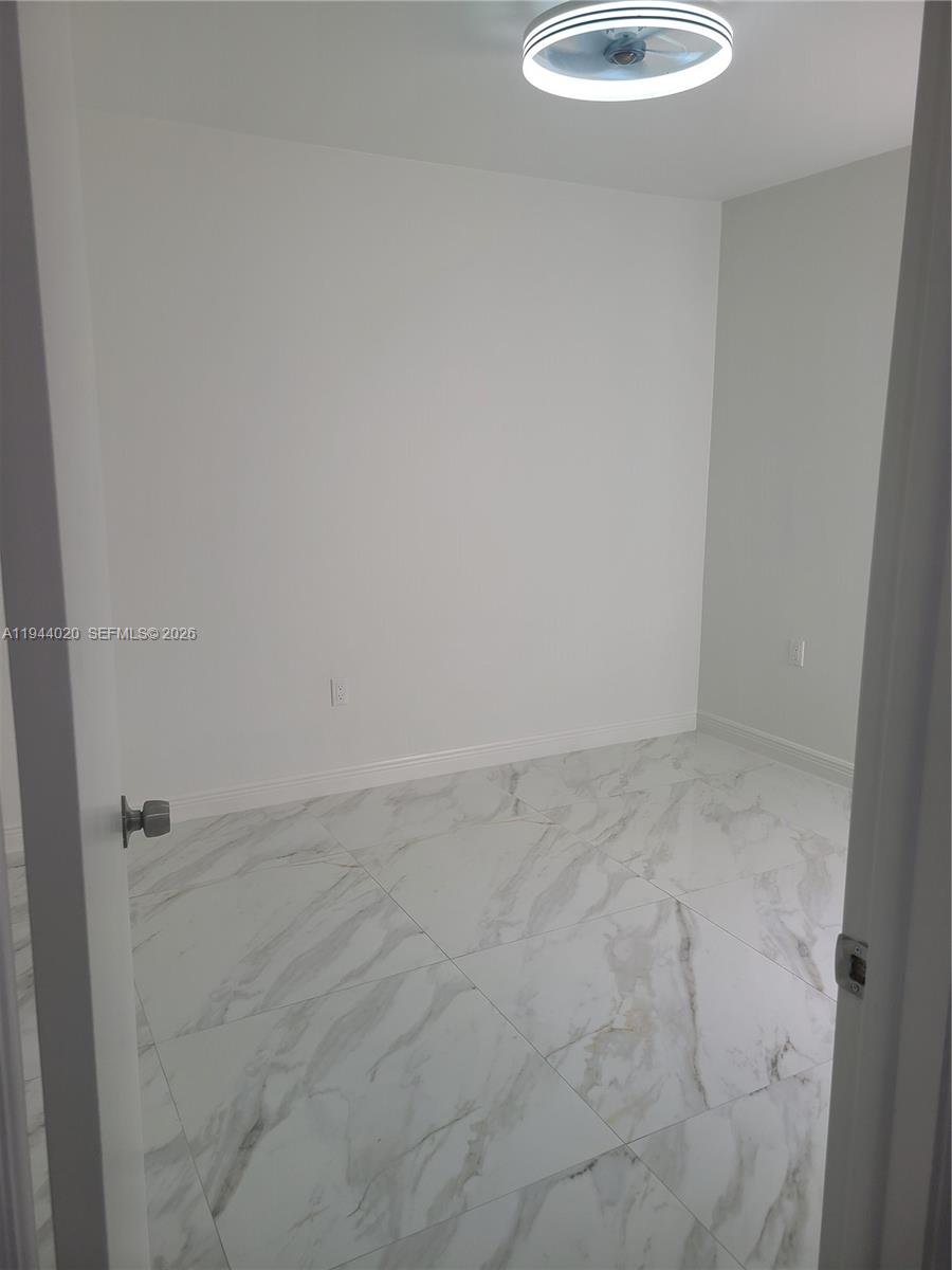 4713 Northwest 7th Street, Unit 1041 Miami, FL 33126 - Photo 4 of 19 a view of a bathroom