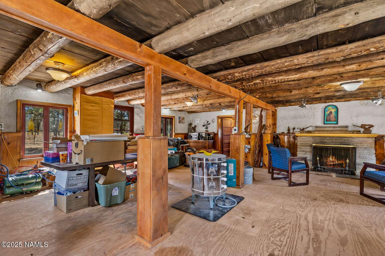995 North Transwestern Pump Road Bellemont, AZ 86015 - Photo 64 of 81 a view of a garage with chairs