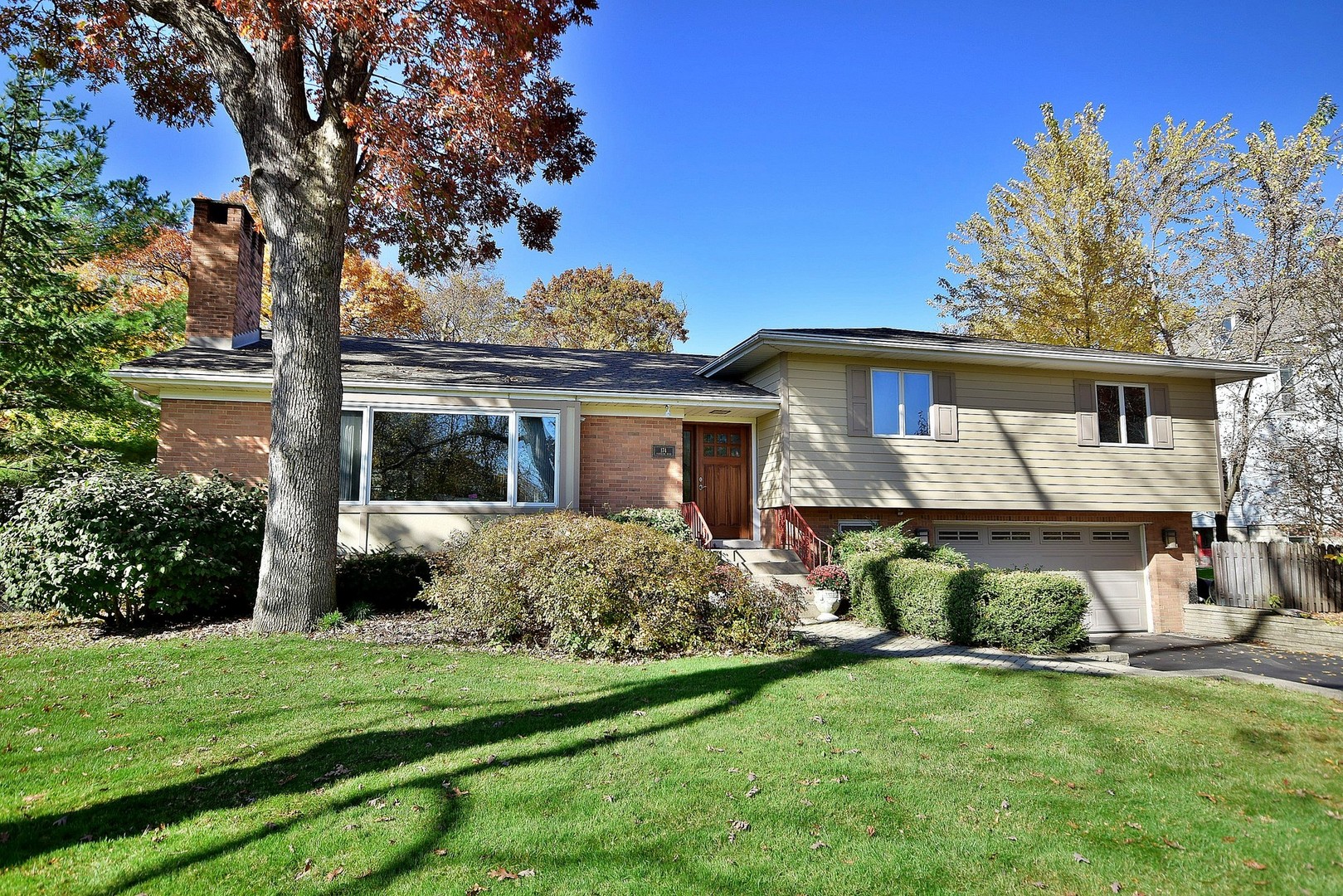 174 Fairbank Road Riverside, IL 60546 - Photo 1 of 31 a front view of a house with garden