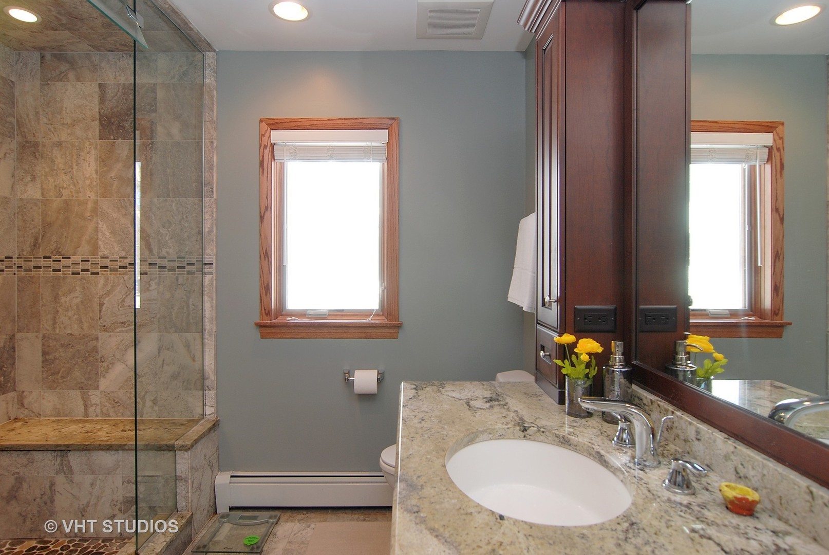 174 Fairbank Road Riverside, IL 60546 - Photo 15 of 31 a bathroom with a sink and a mirror