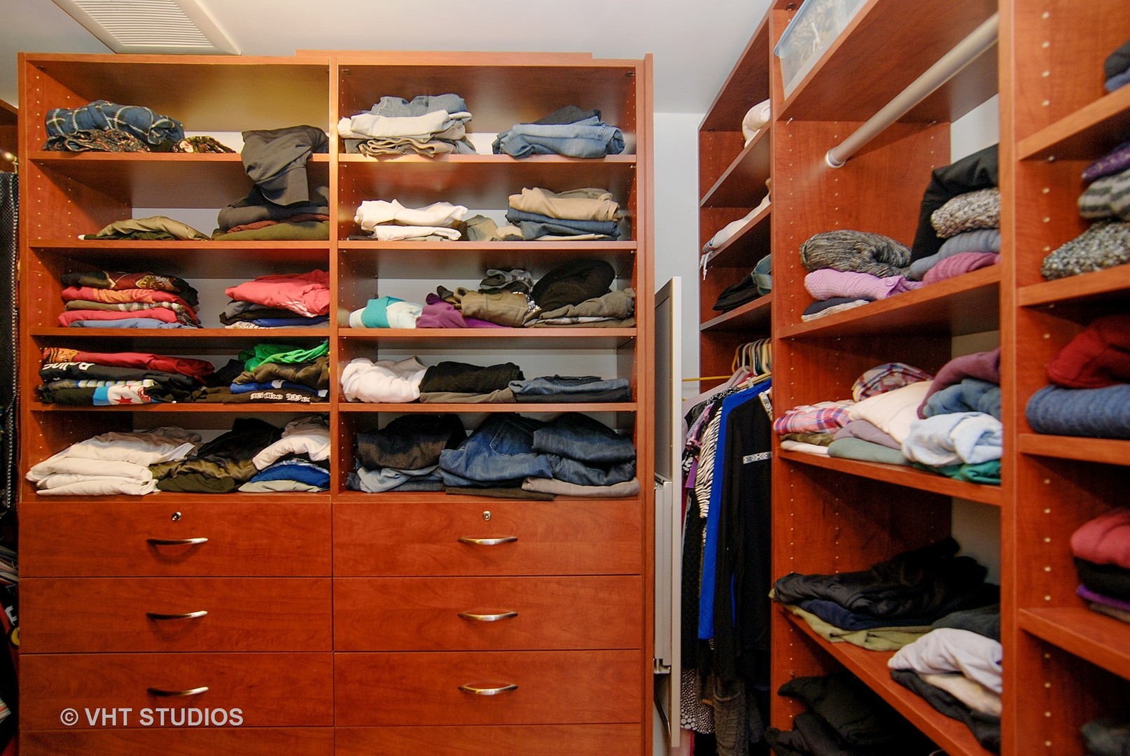 174 Fairbank Road Riverside, IL 60546 - Photo 16 of 31 a view of walk in closet with clothes and shoes