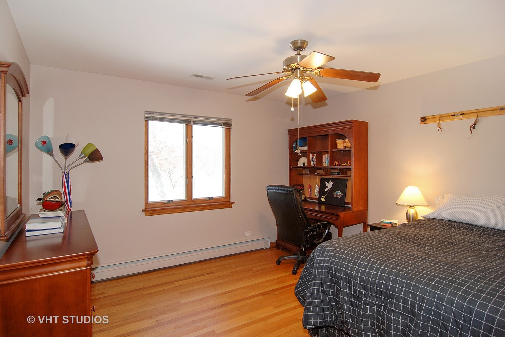 174 Fairbank Road Riverside, IL 60546 - Photo 18 of 31 a bedroom with a bed and wooden floor
