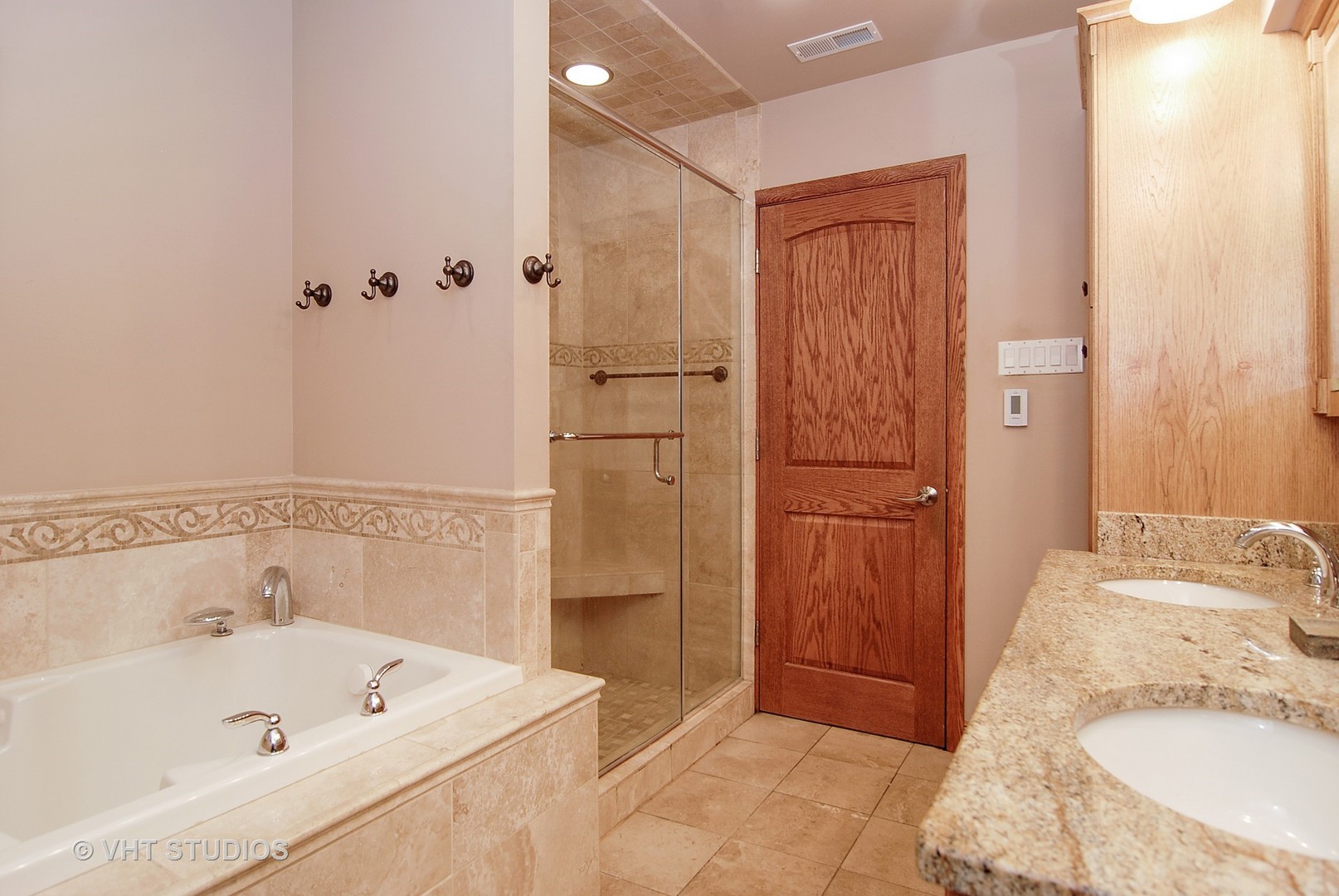 174 Fairbank Road Riverside, IL 60546 - Photo 20 of 31 a bathroom with a tub sink and shower