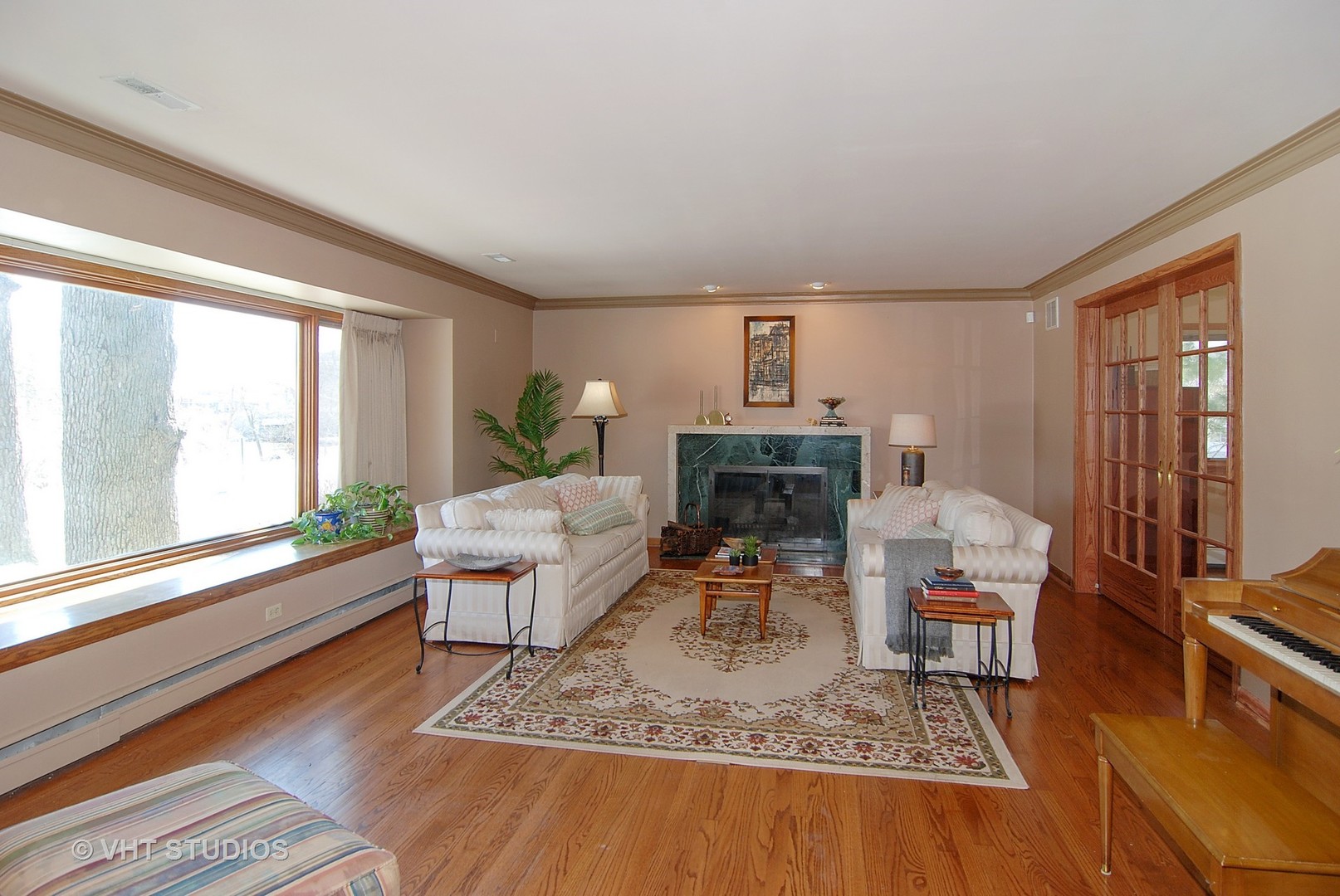 174 Fairbank Road Riverside, IL 60546 - Photo 3 of 31 a living room with furniture and a fireplace