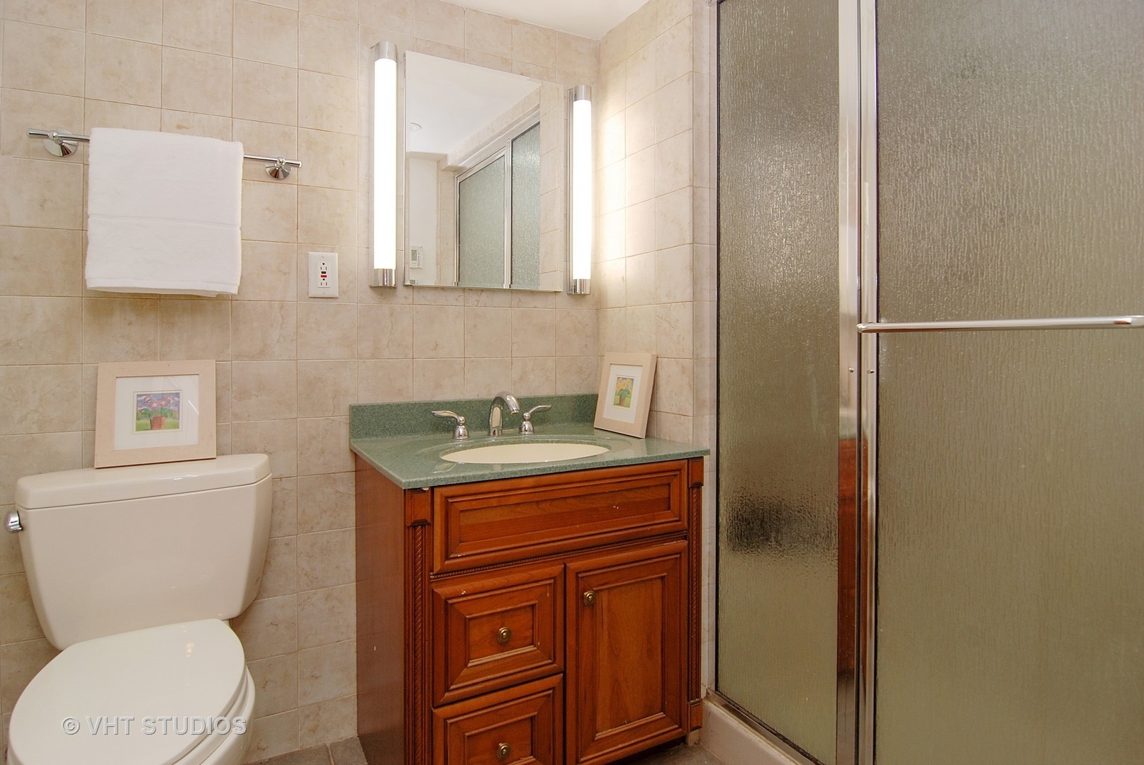 174 Fairbank Road Riverside, IL 60546 - Photo 24 of 31 a bathroom with a toilet sink and mirror