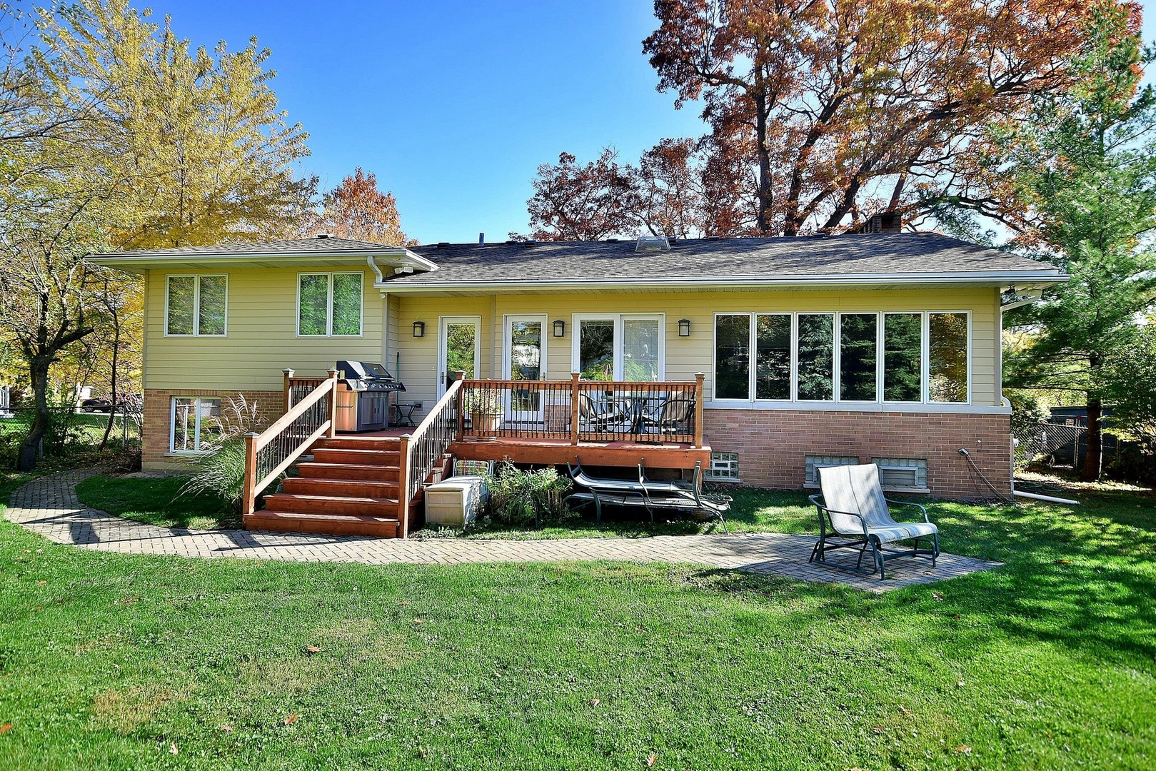 174 Fairbank Road Riverside, IL 60546 - Photo 26 of 31 a front view of a house with garden
