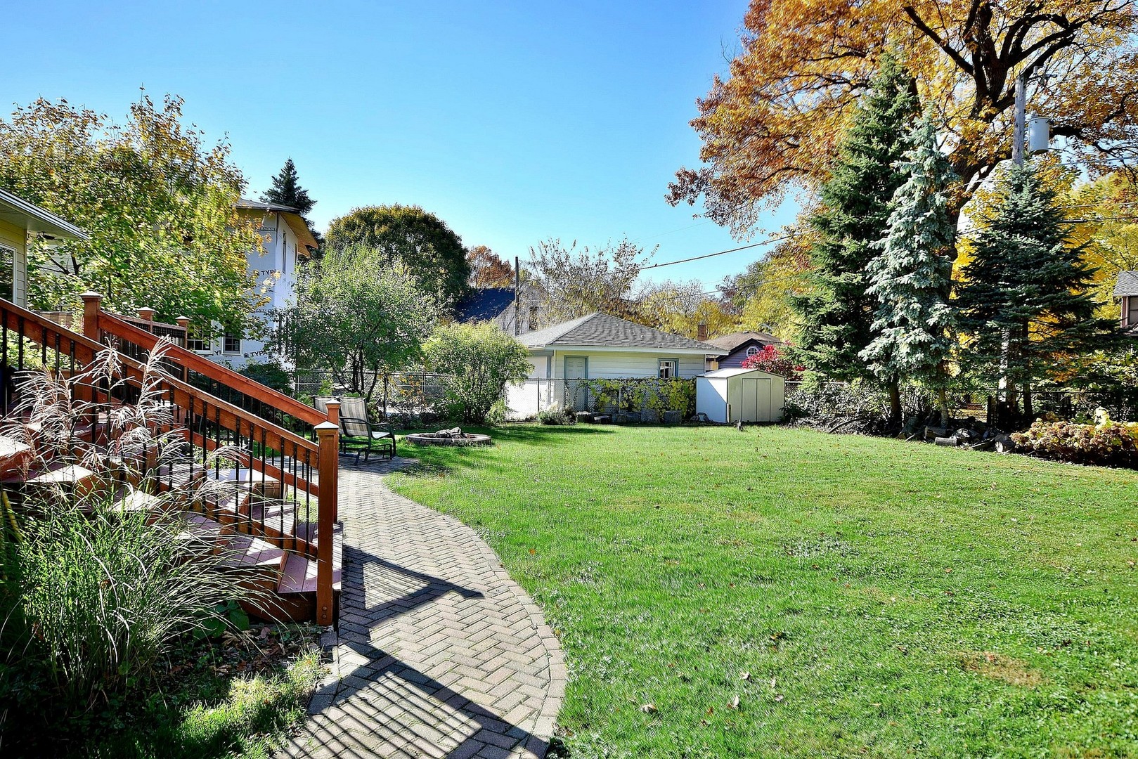 174 Fairbank Road Riverside, IL 60546 - Photo 27 of 31 a view of a house with backyard and garden