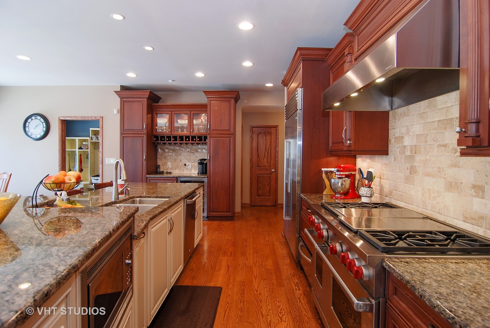 174 Fairbank Road Riverside, IL 60546 - Photo 6 of 31 a kitchen with stainless steel appliances granite countertop a stove and a sink