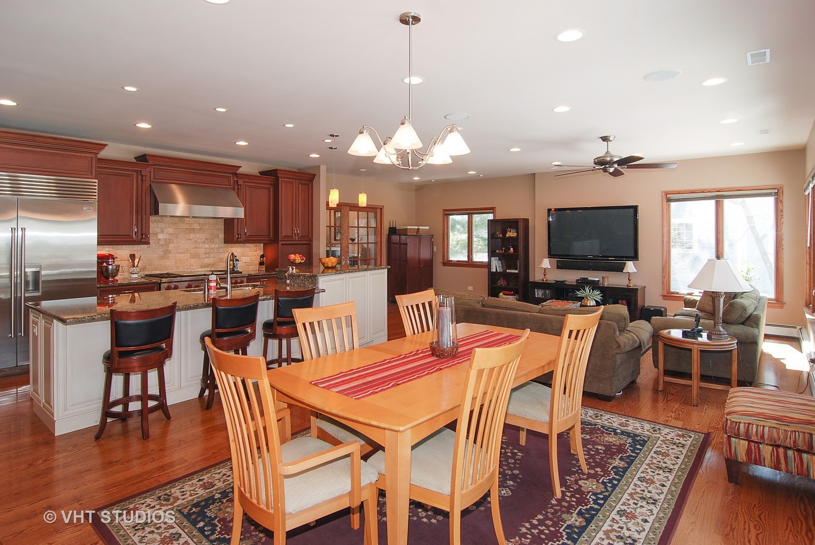 174 Fairbank Road Riverside, IL 60546 - Photo 7 of 31 a view of a dining room with furniture a rug and wooden floor