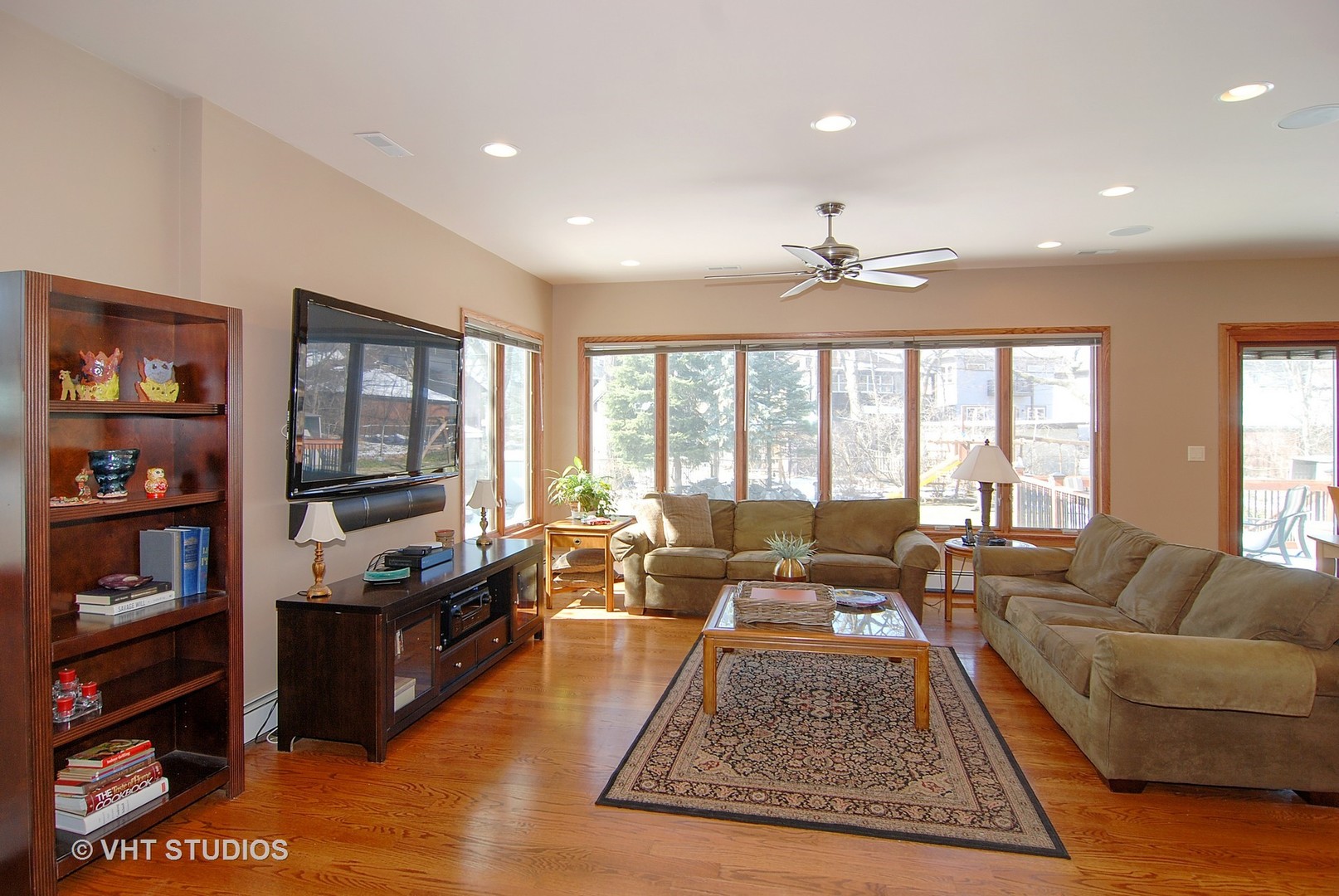 174 Fairbank Road Riverside, IL 60546 - Photo 9 of 31 a living room with furniture hard wood floor and a book shelf