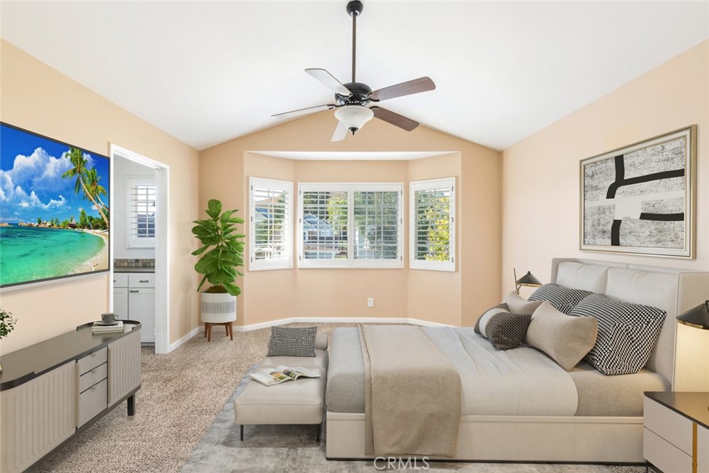 24075 Falconer Drive Murrieta, CA 92562 - Photo 16 of 25 a bedroom with a large bed and a flat screen tv