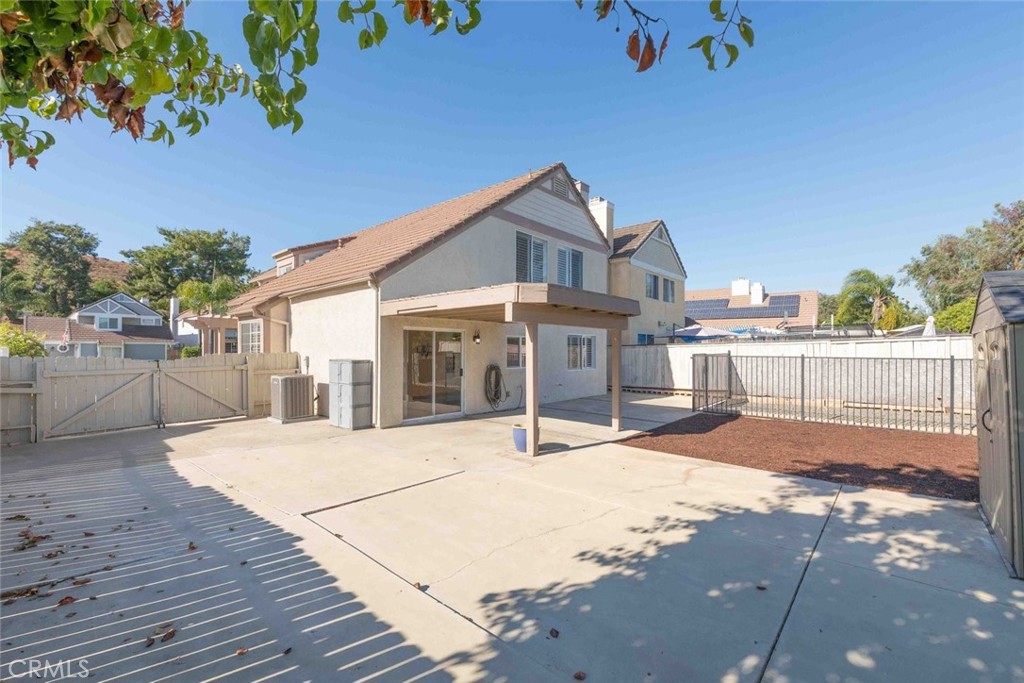 24075 Falconer Drive Murrieta, CA 92562 - Photo 19 of 25 a front view of a house with a yard
