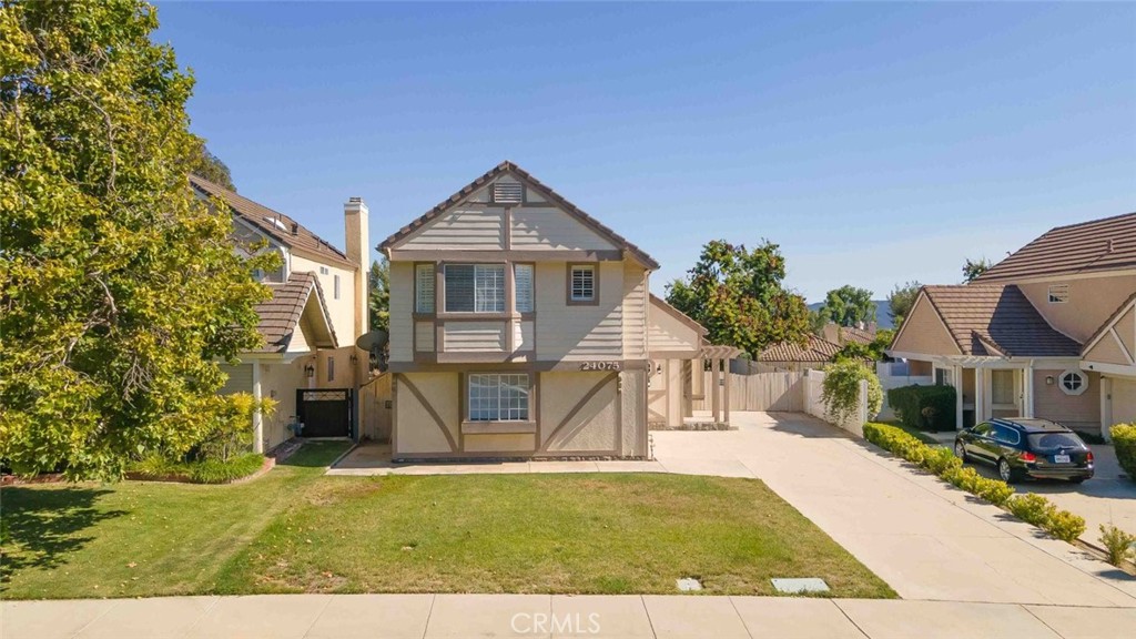 24075 Falconer Drive Murrieta, CA 92562 - Photo 22 of 25 a view of a house with a yard
