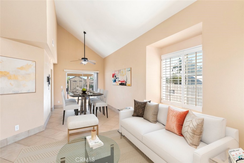 24075 Falconer Drive Murrieta, CA 92562 - Photo 6 of 25 a living room with furniture and a large window