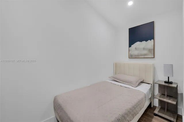 a room with table tennis and a flat screen tv