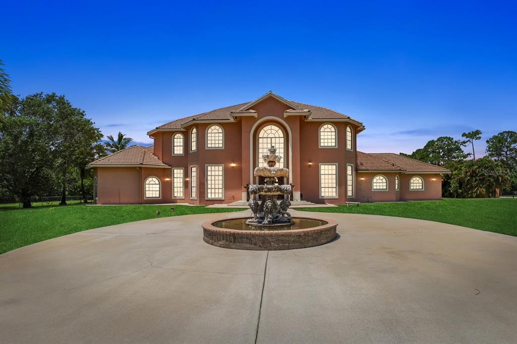 16030 88th Road North Loxahatchee, FL 33470 - Photo 1 of 1 Twilight Front