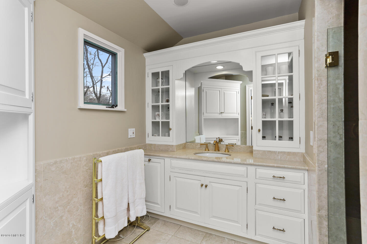 101 Lewis Street, Unit F Greenwich, CT 06830 - Photo 14 of 27 a hallway with sink and cabinets