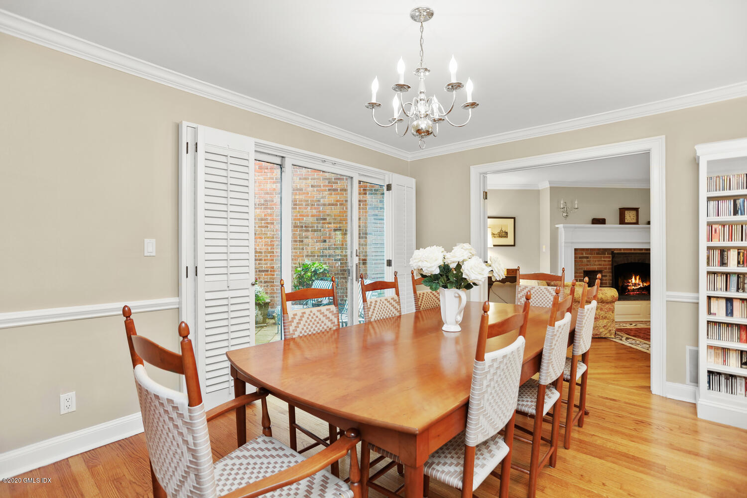 101 Lewis Street, Unit F Greenwich, CT 06830 - Photo 8 of 27 a view of a dining room with furniture window and wooden floor