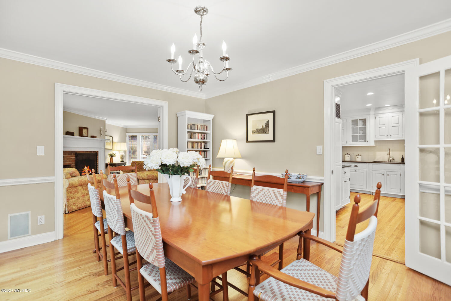 101 Lewis Street, Unit F Greenwich, CT 06830 - Photo 9 of 27 a view of a dining room with furniture and wooden floor