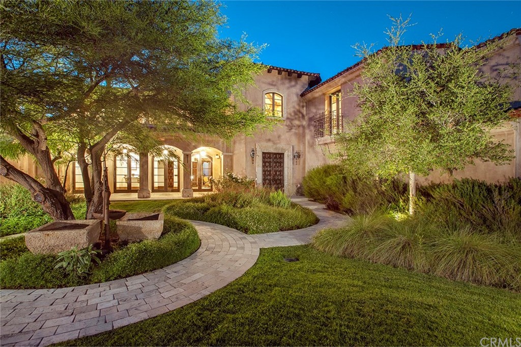 a view of a house with a garden