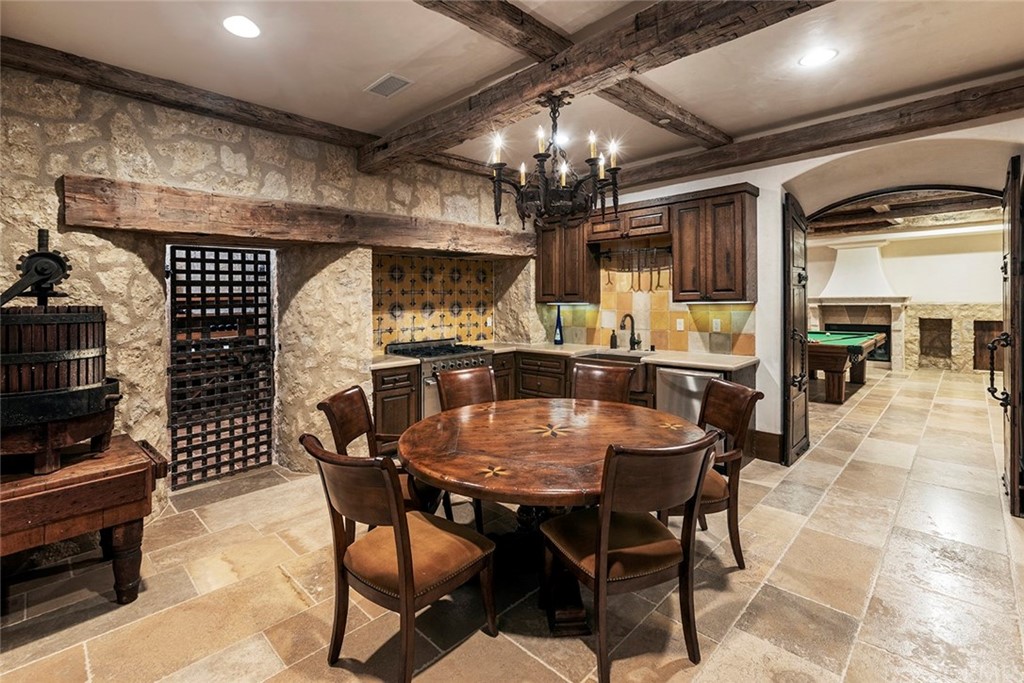 82 Golden Eagle Irvine, CA 92603 - Photo 11 of 40 a view of a dining room with furniture