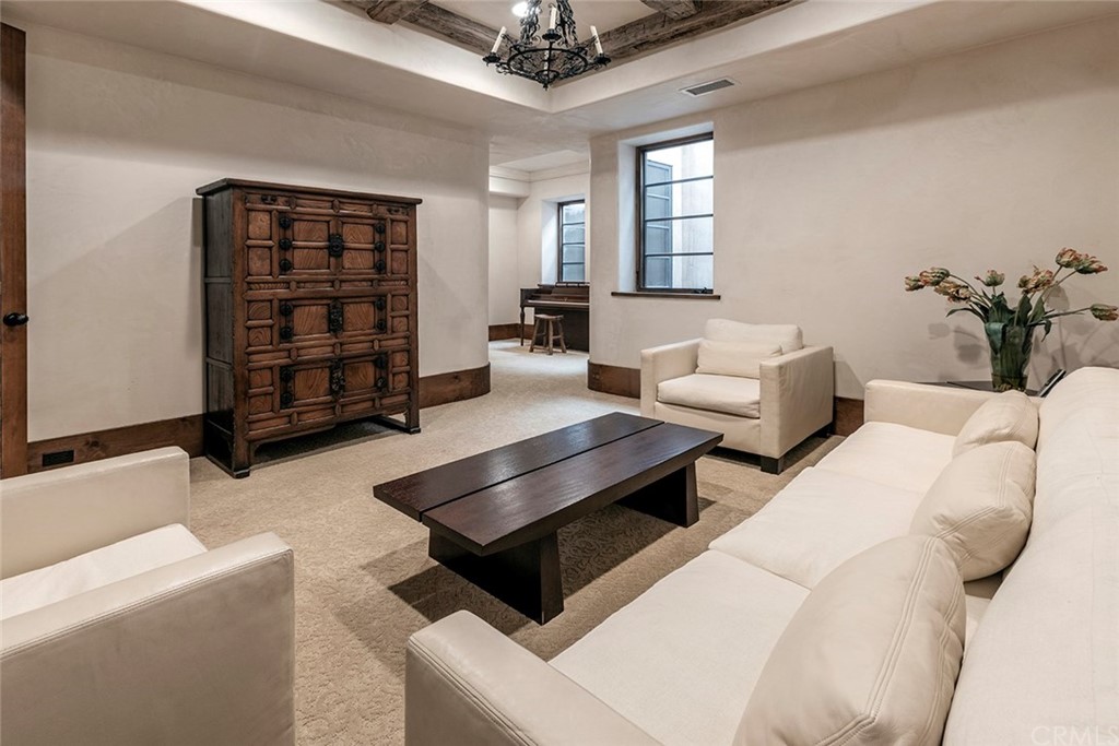 82 Golden Eagle Irvine, CA 92603 - Photo 14 of 40 a living room with furniture and wooden floor