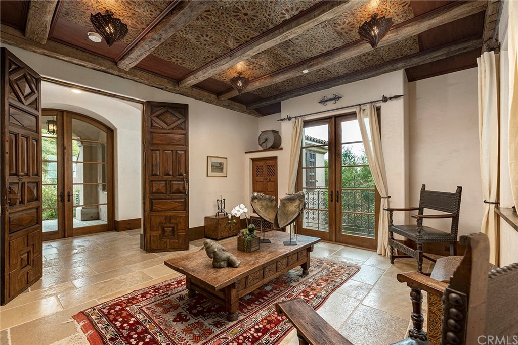 82 Golden Eagle Irvine, CA 92603 - Photo 22 of 40 a living room with furniture and a table