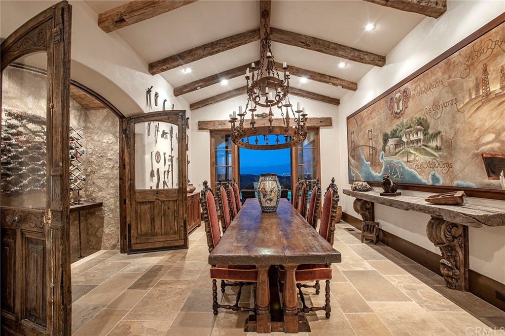 82 Golden Eagle Irvine, CA 92603 - Photo 3 of 40 a view of a dining room with furniture window and wooden floor