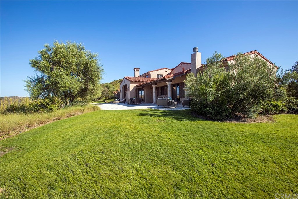 82 Golden Eagle Irvine, CA 92603 - Photo 36 of 40 a view of a house with a yard