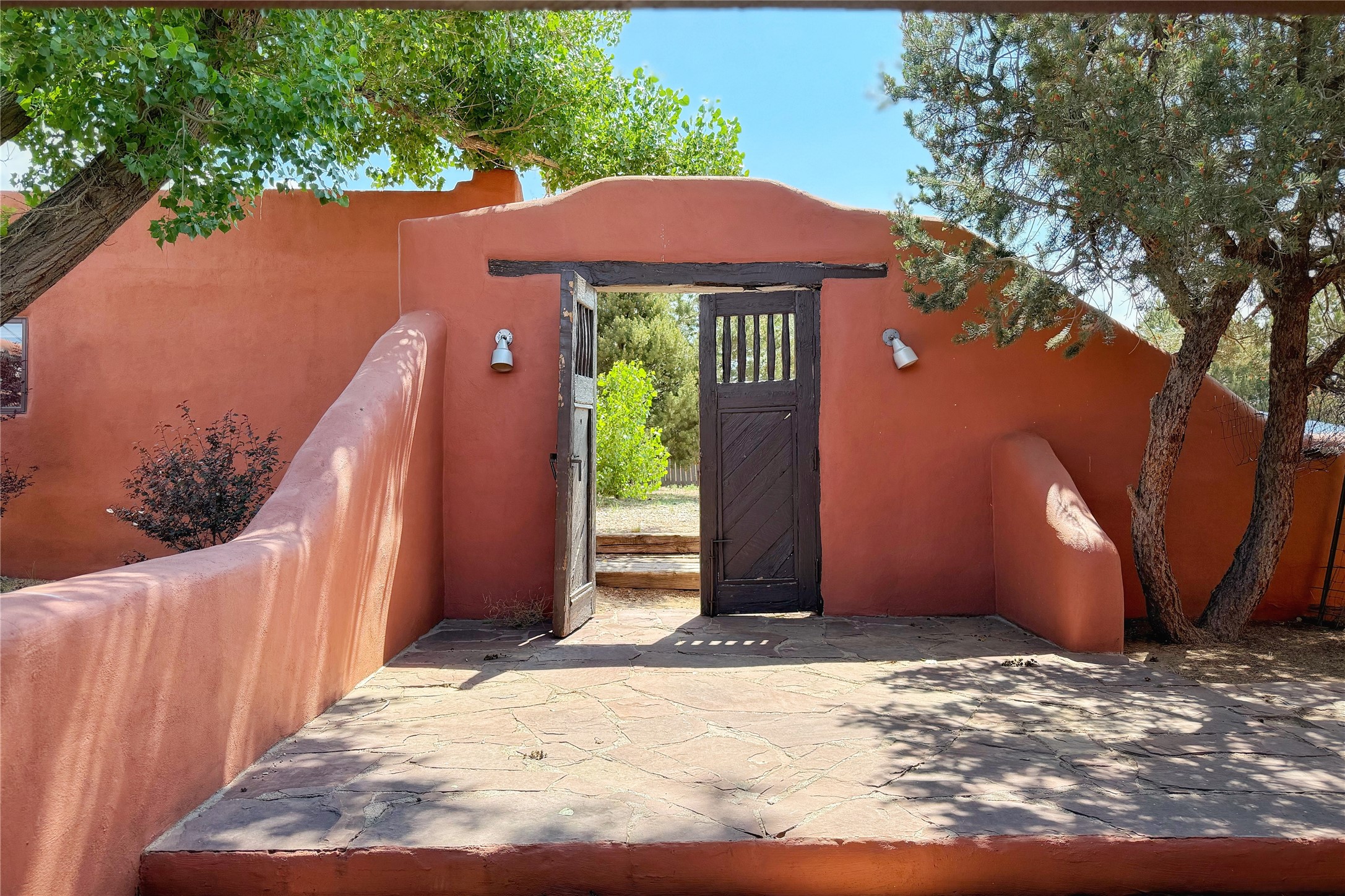 54 Rons Road Santa Fe, NM 87508 - Photo 63 of 99 Entrance to Main House, pool, patios, and Casita back door.