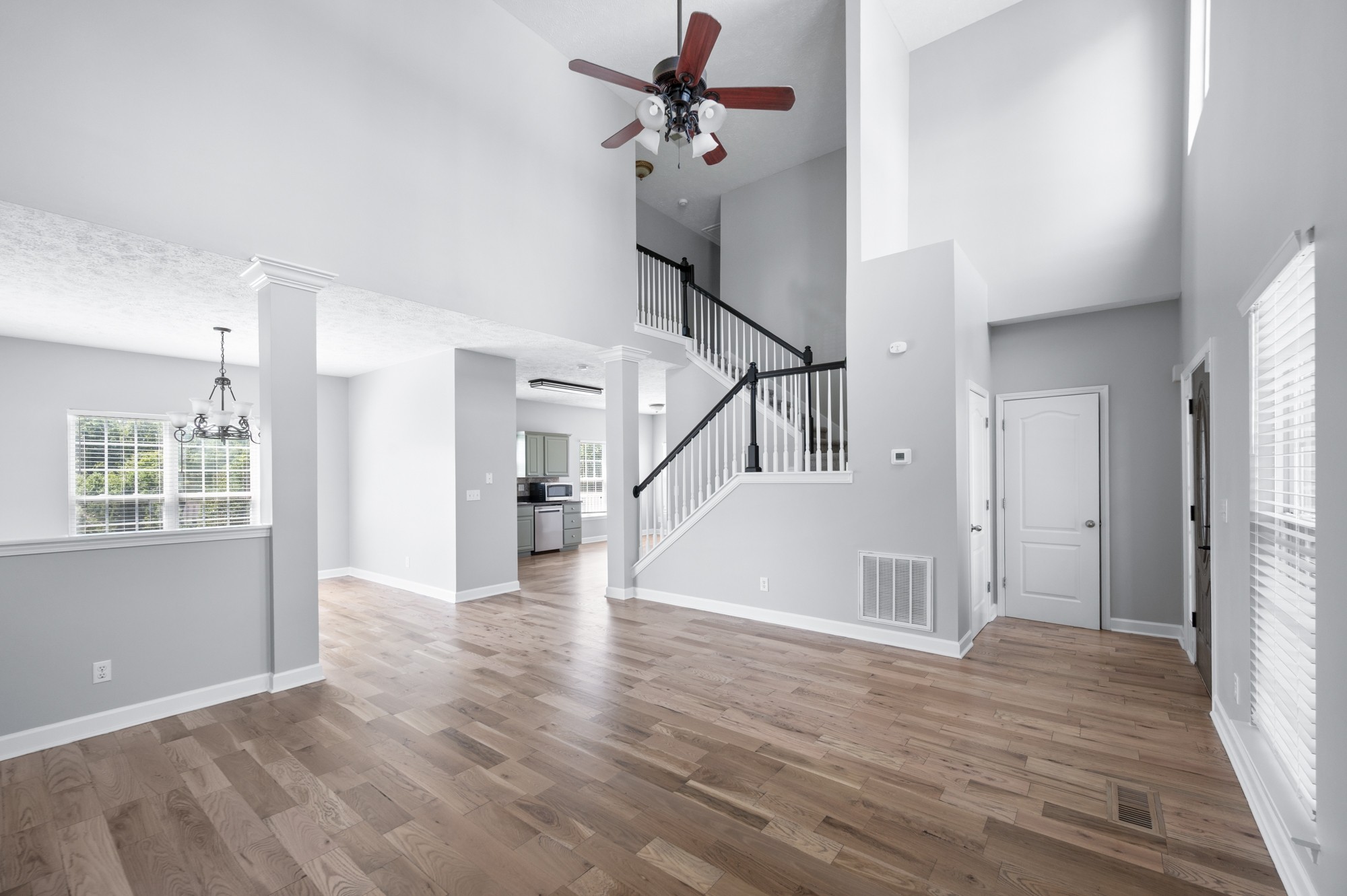 7203 Blue Ridge Drive Fairview, TN 37062 - Photo 12 of 65 a view of empty room with wooden floor and fan