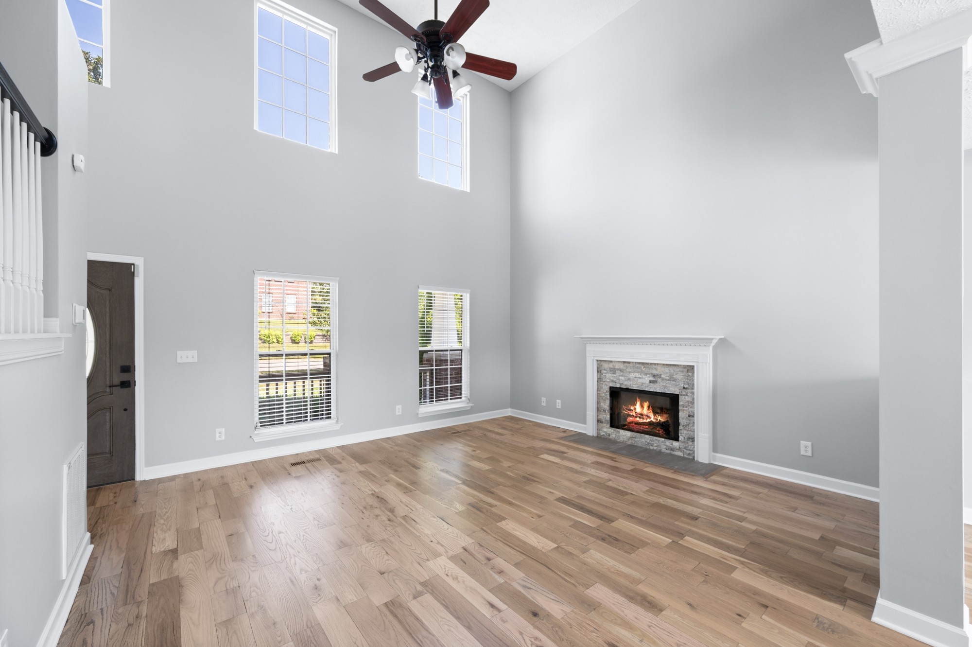 7203 Blue Ridge Drive Fairview, TN 37062 - Photo 14 of 65 a view of an empty room with a window and fireplace