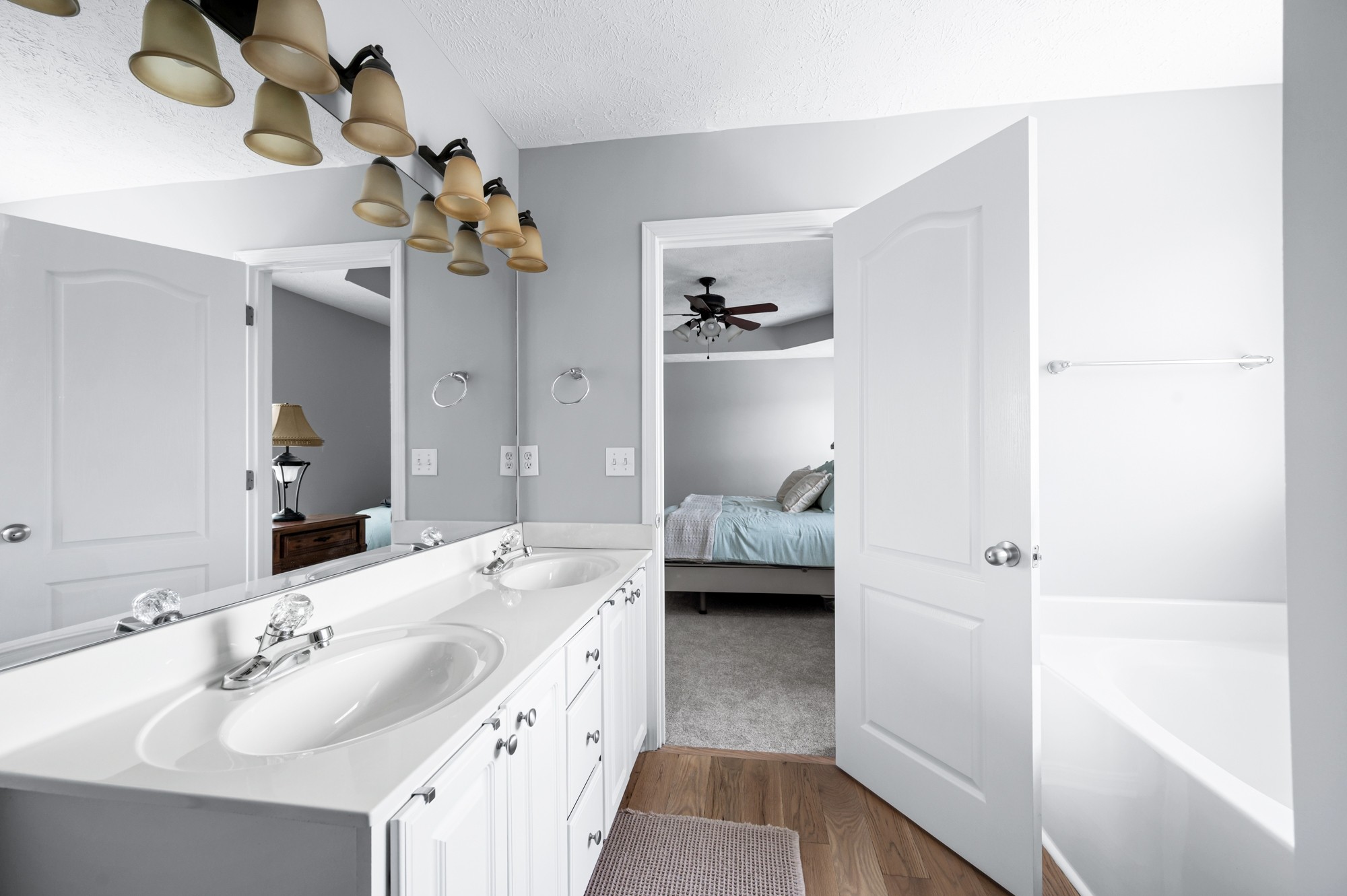 7203 Blue Ridge Drive Fairview, TN 37062 - Photo 30 of 65 a en suite spacious bathroom with a double vanity sink a mirror and shower