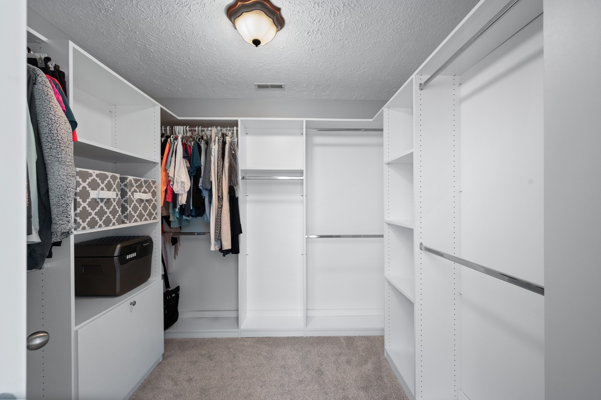 7203 Blue Ridge Drive Fairview, TN 37062 - Photo 34 of 65 a view of walk in closet with clothes and shoes