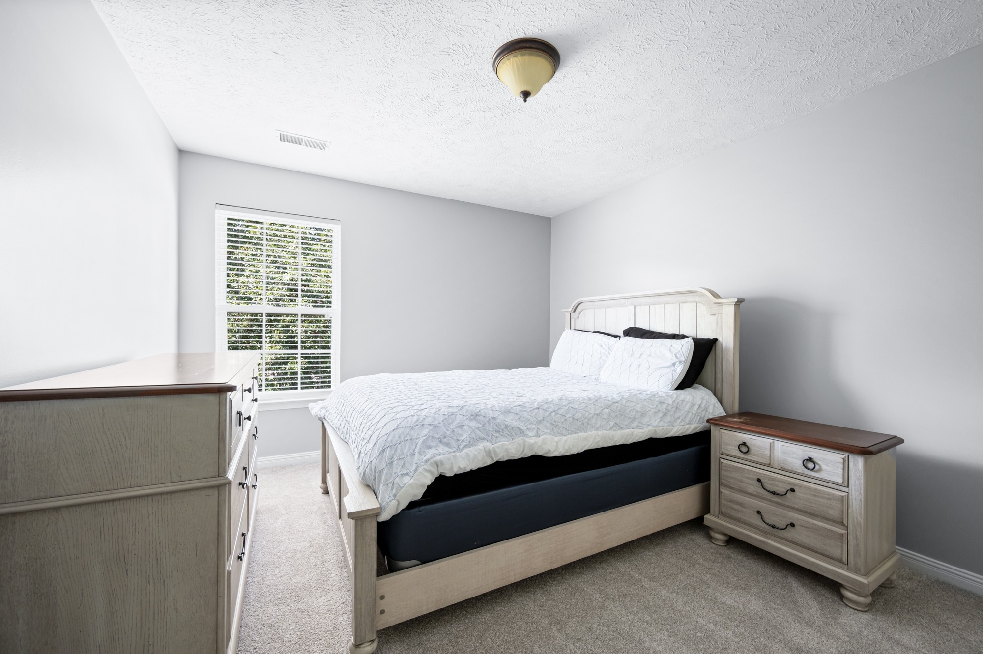 7203 Blue Ridge Drive Fairview, TN 37062 - Photo 35 of 65 a bedroom with a bed and a window