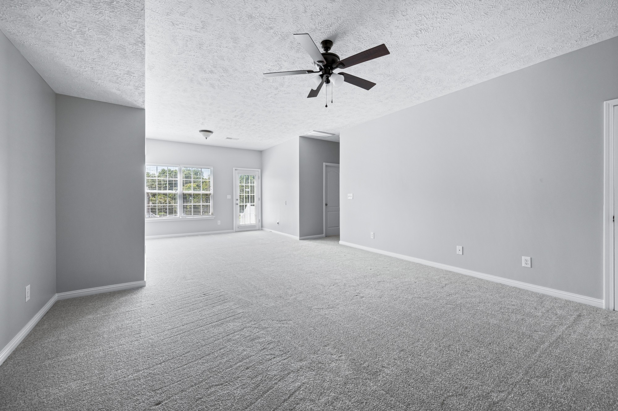 7203 Blue Ridge Drive Fairview, TN 37062 - Photo 39 of 65 a view of a livingroom with a ceiling fan and window