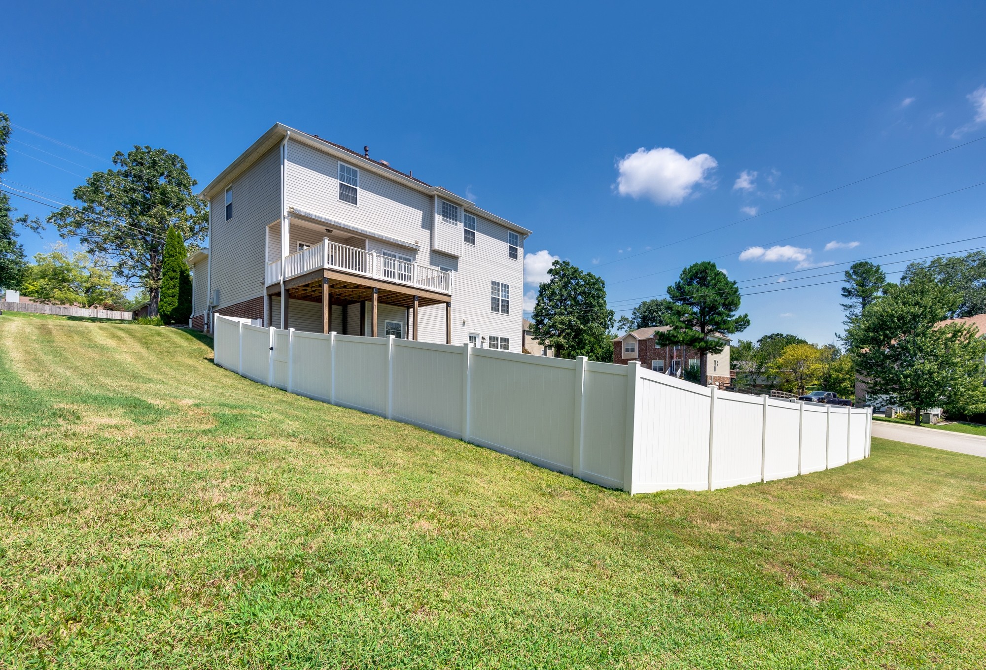7203 Blue Ridge Drive Fairview, TN 37062 - Photo 57 of 65 a front view of a house with a yard and a fence