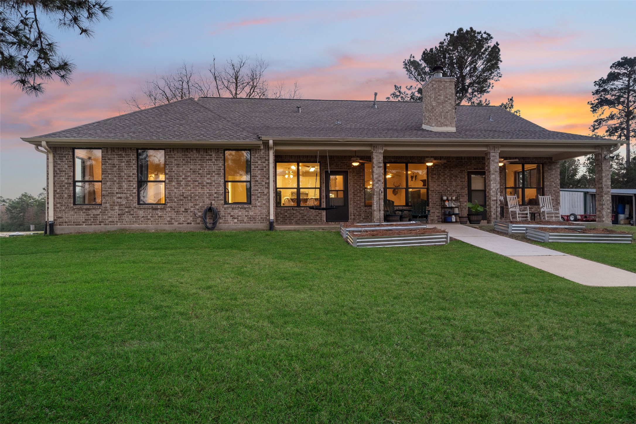 394 Farm To Market 230 Trinity, TX 75862 - Photo 2 of 34 a front view of a house with a yard