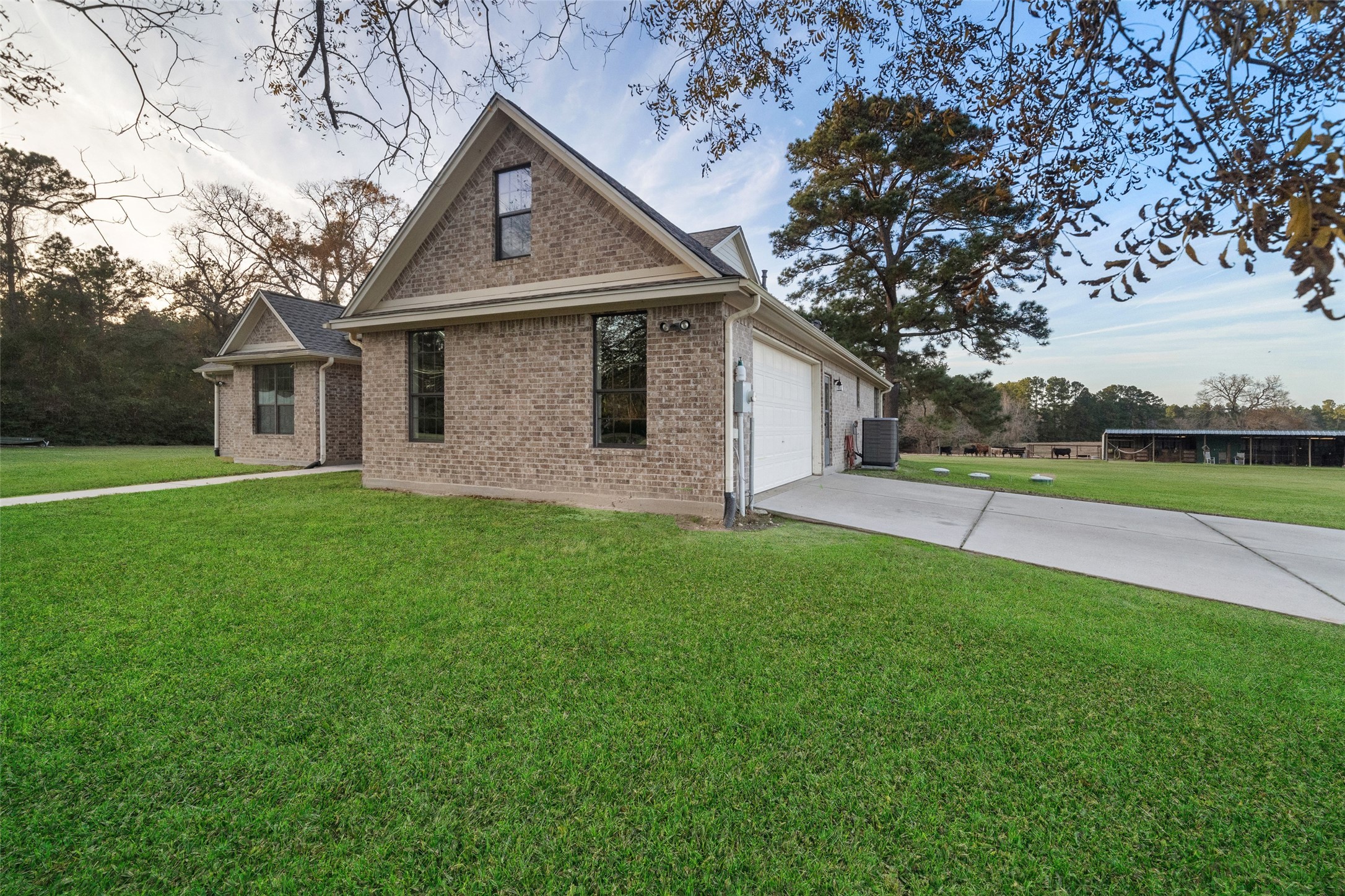 394 Farm To Market 230 Trinity, TX 75862 - Photo 23 of 34 a front view of house with yard and green space