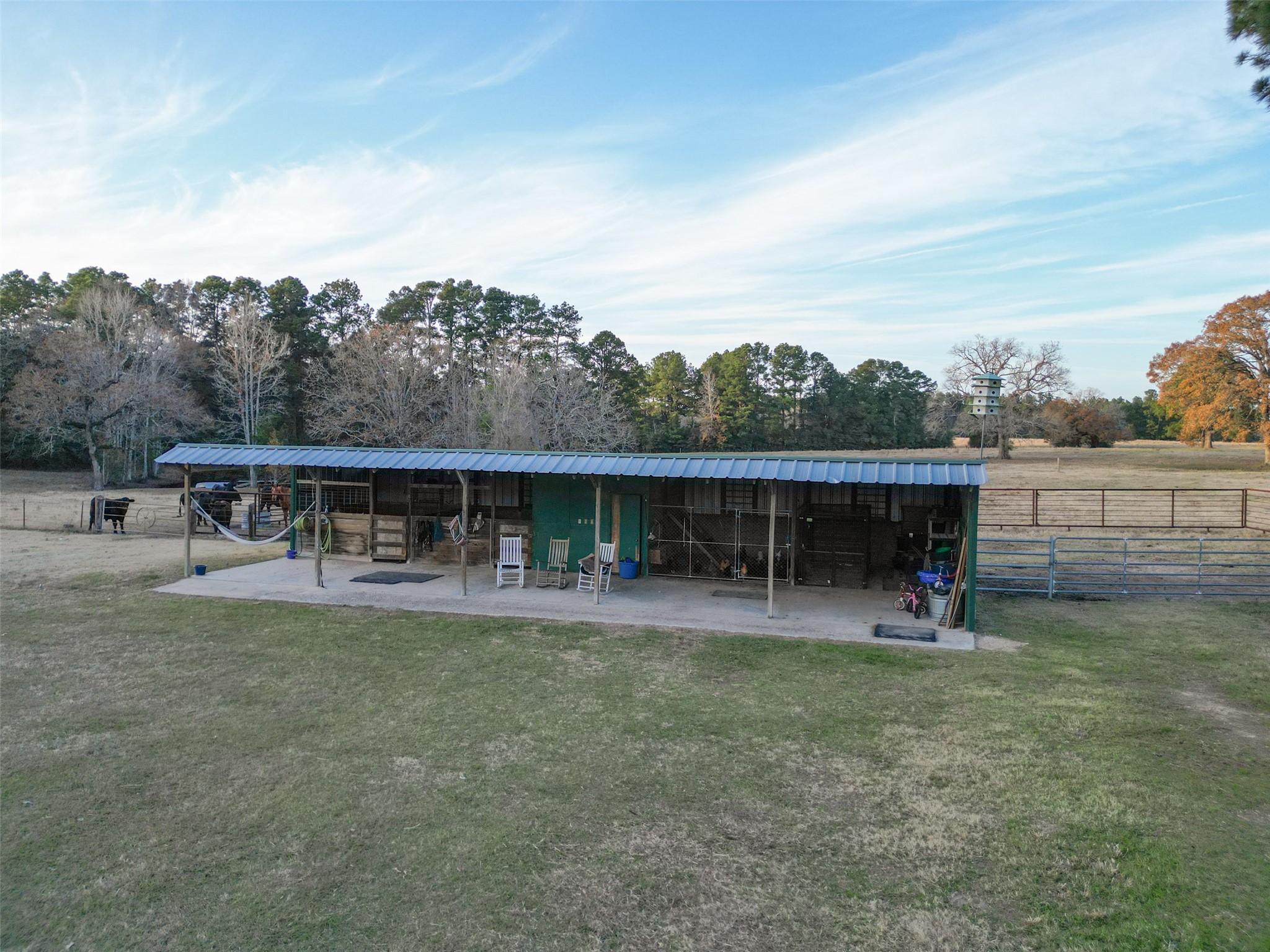 394 Farm To Market 230 Trinity, TX 75862 - Photo 24 of 34 a view of a house with backyard porch and sitting area