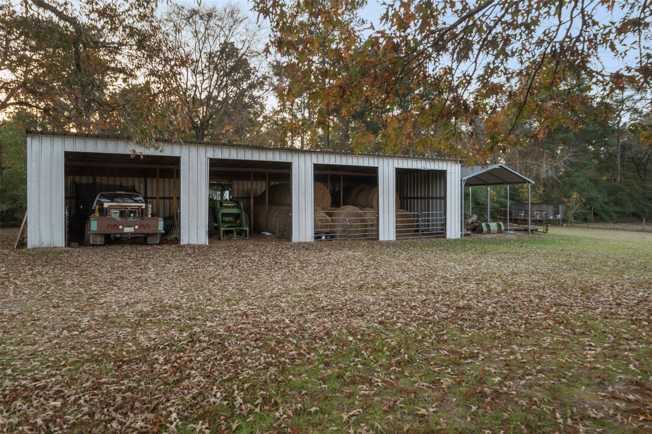 394 Farm To Market 230 Trinity, TX 75862 - Photo 29 of 34 a view of a house with a backyard