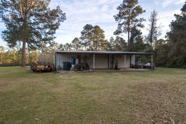 a backyard of a house with lots of green space