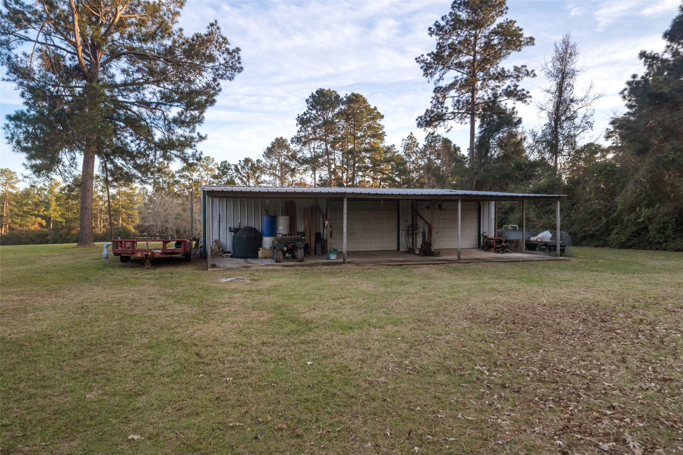 394 Farm To Market 230 Trinity, TX 75862 - Photo 30 of 34 a view of a house with a yard and a tree