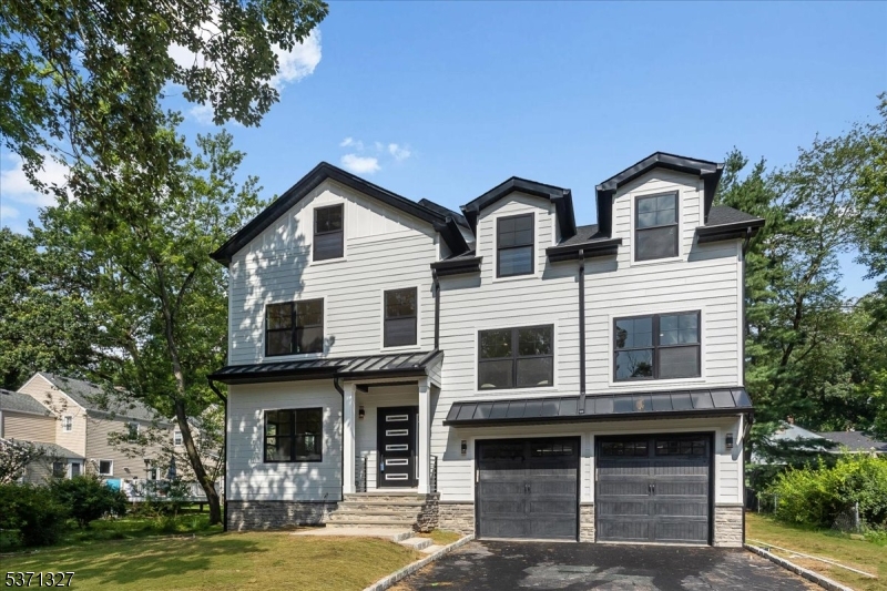 a house view with a garden space