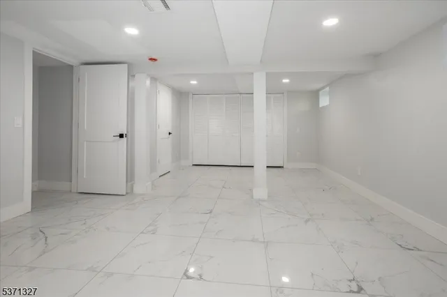 a view of a house with wooden deck